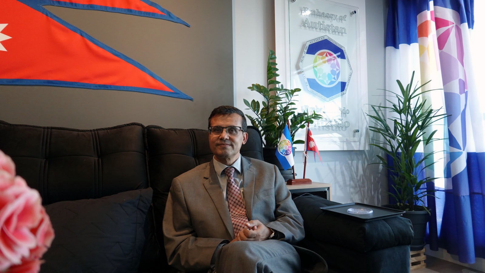A moment in the reception area of the Embassy of Autistan.