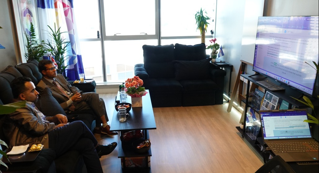 The presentation in progress at the Embassy of Autistan.
